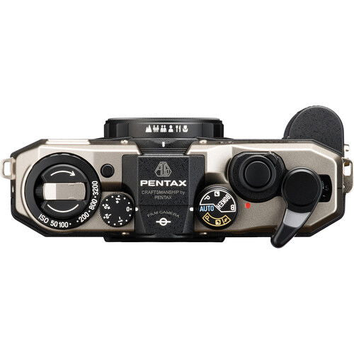 Pentax 17 film camera top controls view, dark silver body with dials and lens area