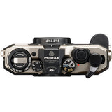Pentax 17 film camera top controls view, dark silver body with dials and lens area