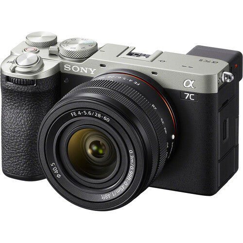 Aparat foto mirrorless Sony cu obiectiv 28-60 mm și mâner, corp negru-argintiu