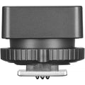 Wireless flash trigger transmitter module with metal mount and contacts, dark gray