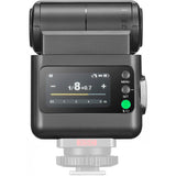 Dark mini TTL speedlite rear control panel with M/menu buttons and display