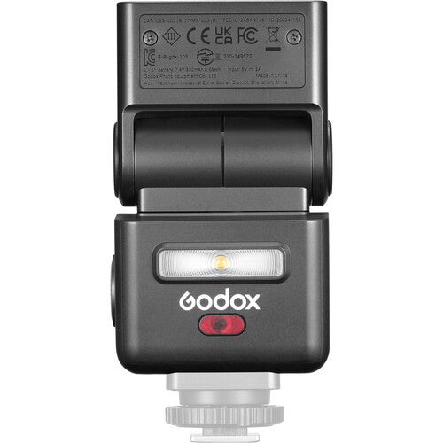 Dark mini TTL speedlite rear label area with LED indicators and brand logo