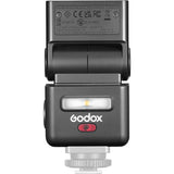 Dark mini TTL speedlite rear label area with LED indicators and brand logo