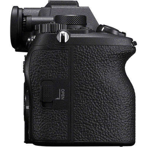 Mirrorless camera back with textured grip and OPEN label on the panel