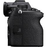 Mirrorless camera back with textured grip and OPEN label on the panel