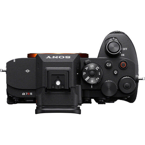 Mirrorless camera top with mode dial, ON/OFF switch, and labeled control buttons