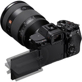 Mirrorless full-frame camera body with attached zoom lens and viewfinder controls