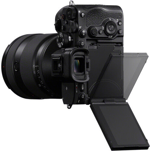 Mirrorless camera body with lens, tilting LCD screen and control dials