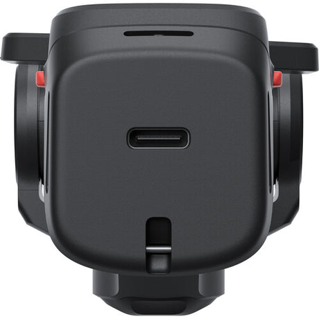 Cameră gimbal neagră din spate, cu port USB și buton central