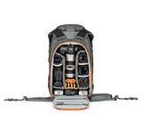 Gray photo backpack open, showing padded camera compartments and lens dividers with orange trim