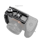 Half cage top plate with threaded holes, mounted on camera, gray/black