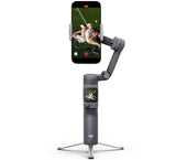 Smartphone mounted on gimbal stabilizer with live preview on screen