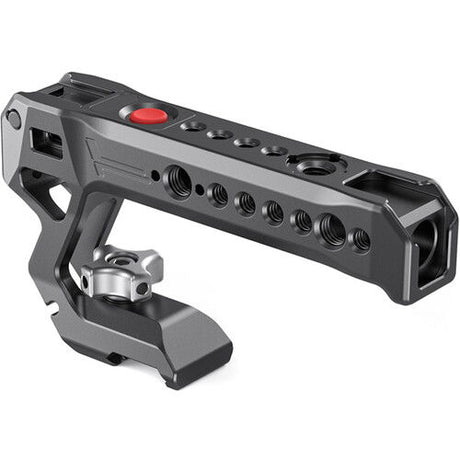 Compact NATO top handle with red record button, handgrip, and multi-hole rail