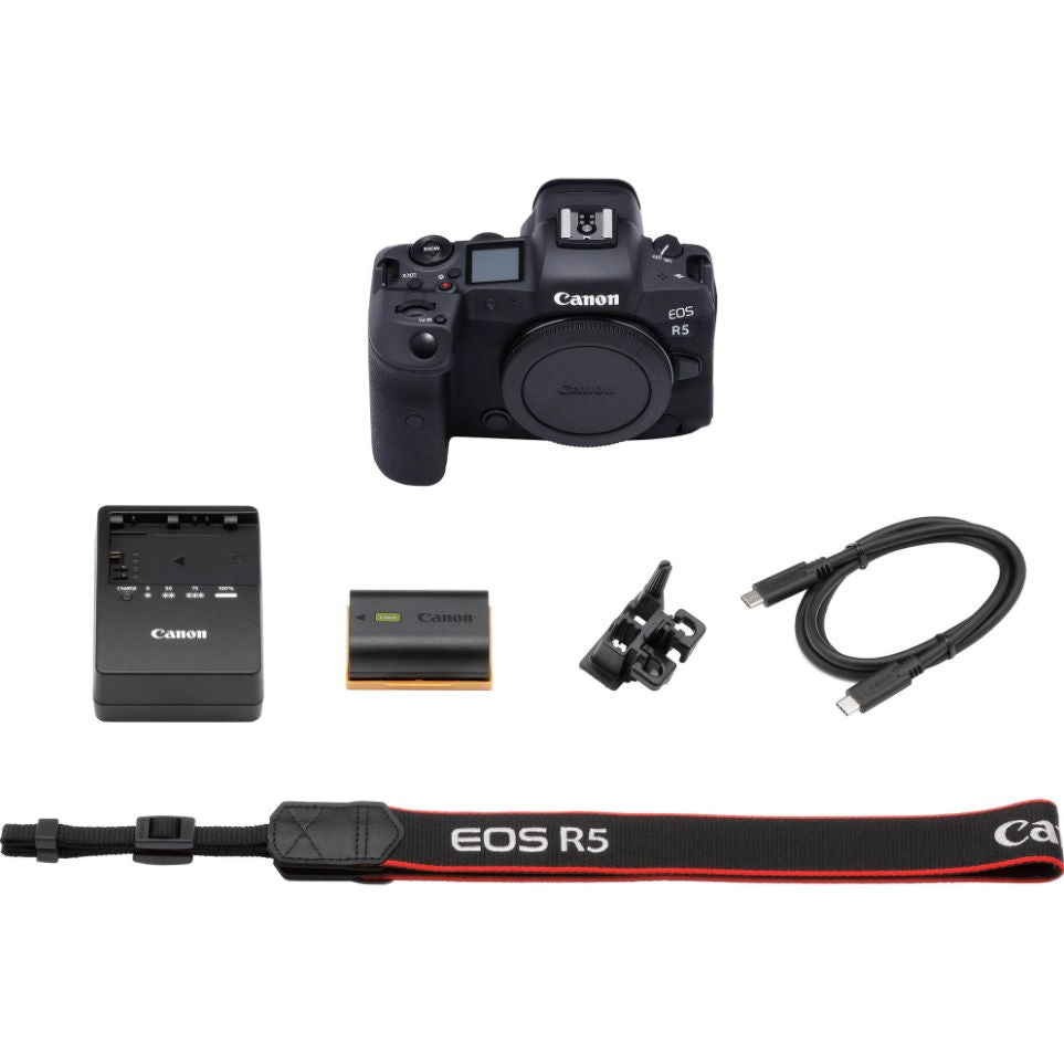 EOS R5 mirrorless camera kit items: camera body, battery, charger, straps, cables
