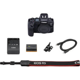 EOS R5 mirrorless camera kit items: camera body, battery, charger, straps, cables
