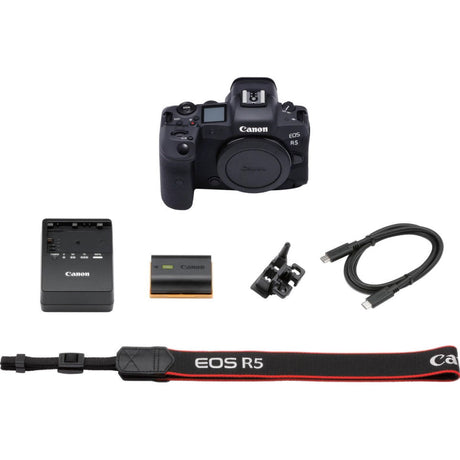 Aparat foto mirrorless Canon EOS R5 cu accesorii: curea, cablu, baterie și încărcător
