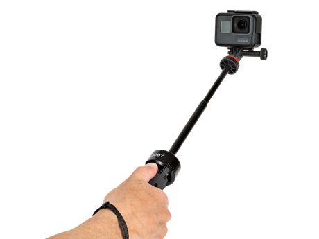 Minitrepied telescopic ținut în mână, cu cameră montată deasupra