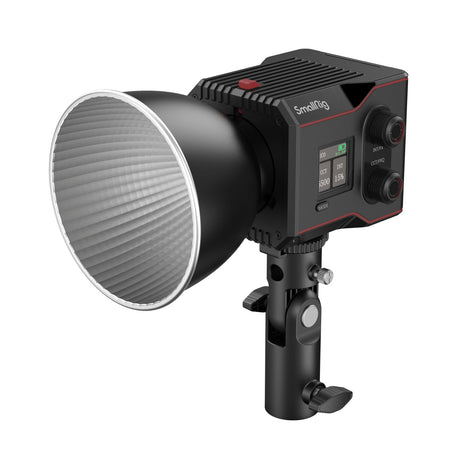 Bi-color LED video light with wide reflector, black handle, and rear LCD control panel
