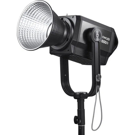 LED daylight studio light with silver reflector head and OWLLED control dial