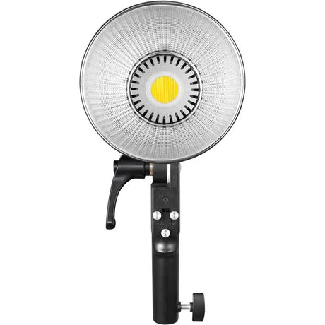 Bi-color LED lamp front view with silver reflector and bright yellow LED lens