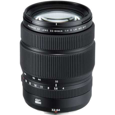 32-64mm mirrorless zoom lens in black, front barrel markings and filter rim