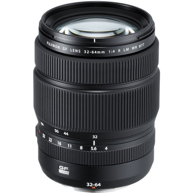 32-64mm mirrorless zoom lens in black, front barrel markings and filter rim