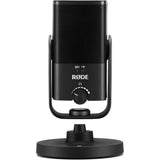 Back view of black USB podcast microphone on base, showing control dial and handle