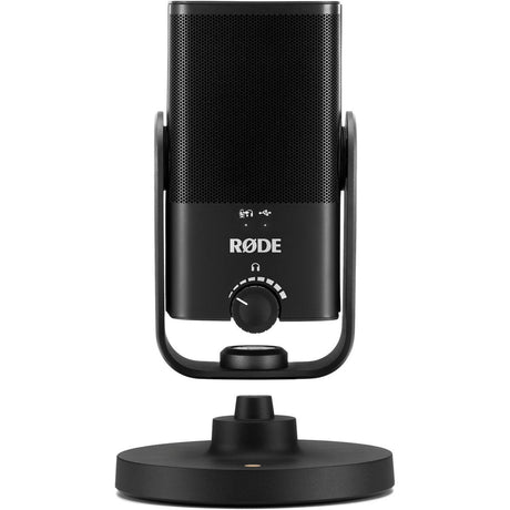 Back view of black USB podcast microphone on base, showing control dial and handle