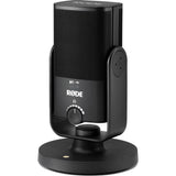 Black USB podcast microphone with top grille and side power/port panel visible