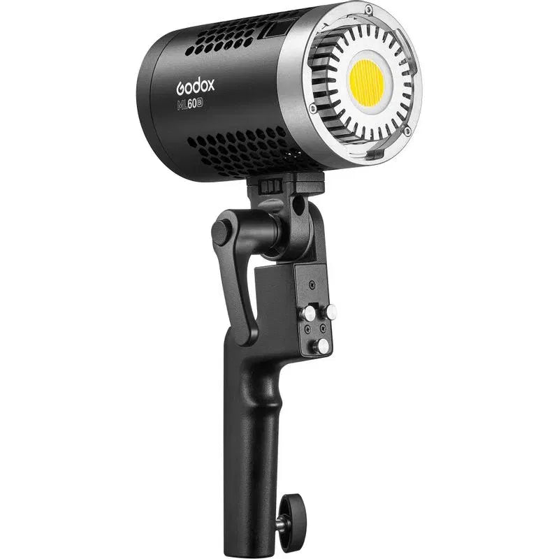 Bi-color LED lamp side view: circular LED head, black handle, adjustable bracket