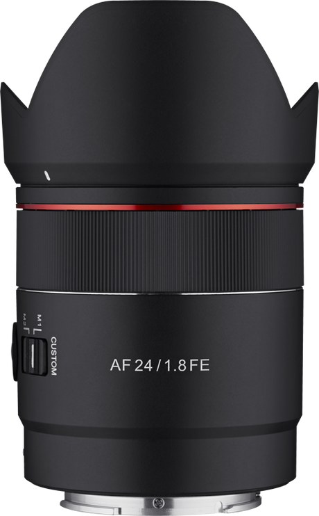Front view of black AF 24mm f/1.8 FE lens with red accent ring and ribbed barrel