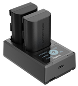 Dual LP‑E6N battery charger with two batteries seated on dock