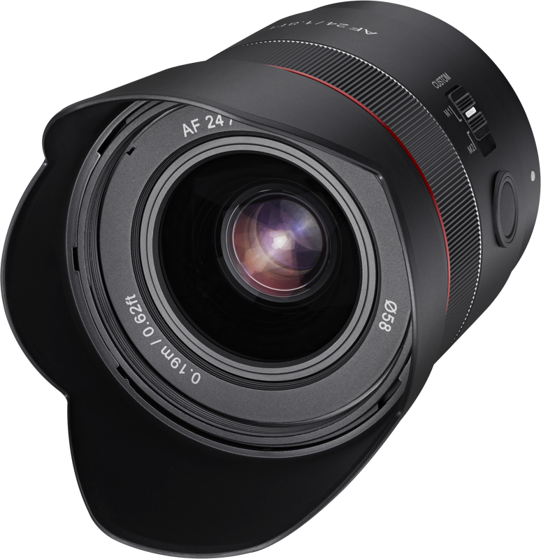 Diagonal view of black AF 24mm f/1.8 FE lens with front glass element and grip ring