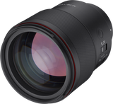 Close-up of black 135mm f/1.8 FE lens front glass, textured grip, red ring