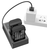 Dual charger dock with two LP‑E6N batteries and plug-in power adapter