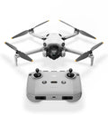 Mini 4 Pro drone front view, folded propellers, camera gimbal, white body