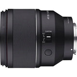 Side view of black 85mm F1.4 lens with custom M1/M2 switch and control dial