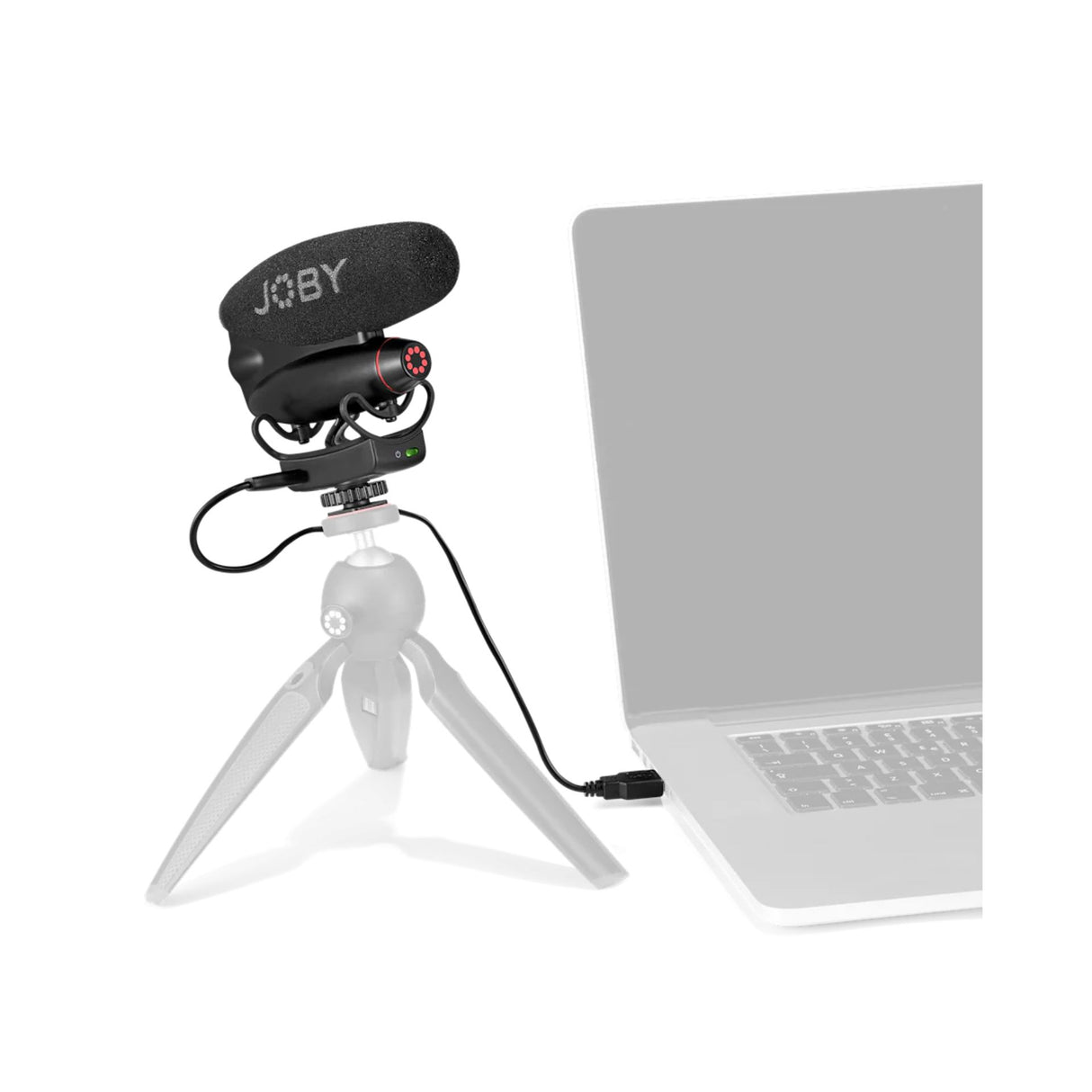 Black shotgun microphone with foam windscreen on camera rig with connected cable