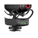 Black shotgun mic base with green power light and metal adjustment dial