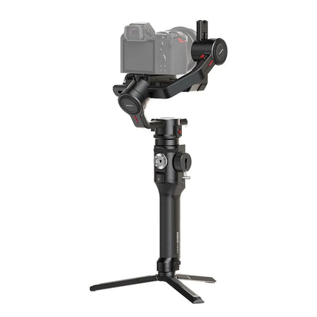 Air 2S camera gimbal stabilizer with mounted camera and side dials on tripod
