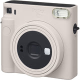 Chalk white Instax SQ1 instant camera front angle with flash window and controls