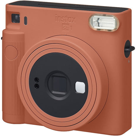 Terracotta orange Instax SQ1 instant camera front with flash window and camera controls