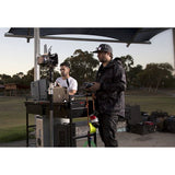 19-inch monitor/recorder on an on-location production cart with cables