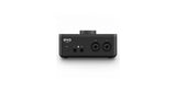 Black USB audio interface rear panel with multiple ports and two large connector areas