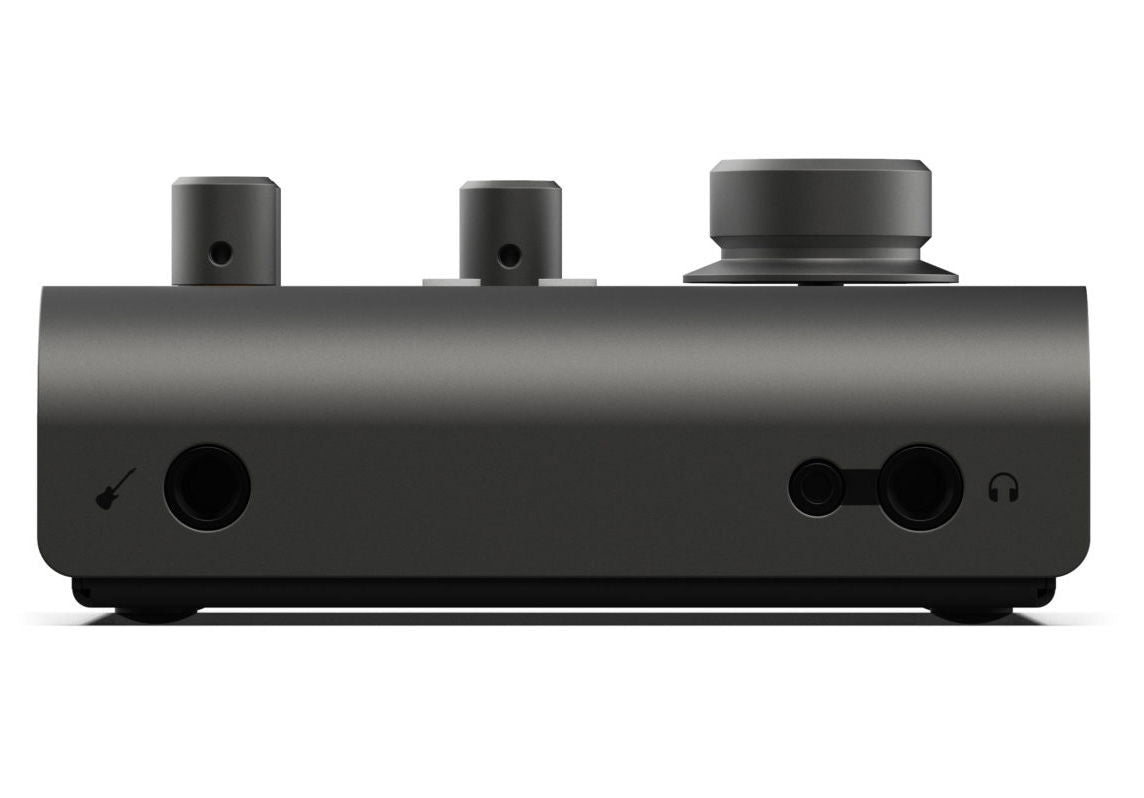 Side view of black audio interface with headphone jack and two rear connection ports