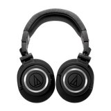 Pair of black over-ear Bluetooth headphones with illuminated ring on ear cups