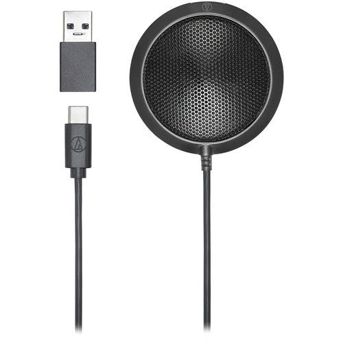 Omnidirectional USB microphone with round mesh grille and stand base
