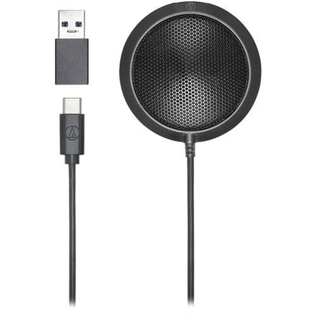 Omnidirectional USB microphone with round mesh grille and stand base