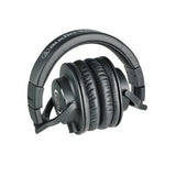 Căști monitor over-ear, vedere laterală; pernițe negre și căști rotunde