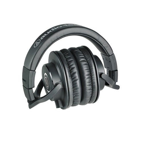 Căști monitor over-ear, vedere laterală; pernițe negre și căști rotunde